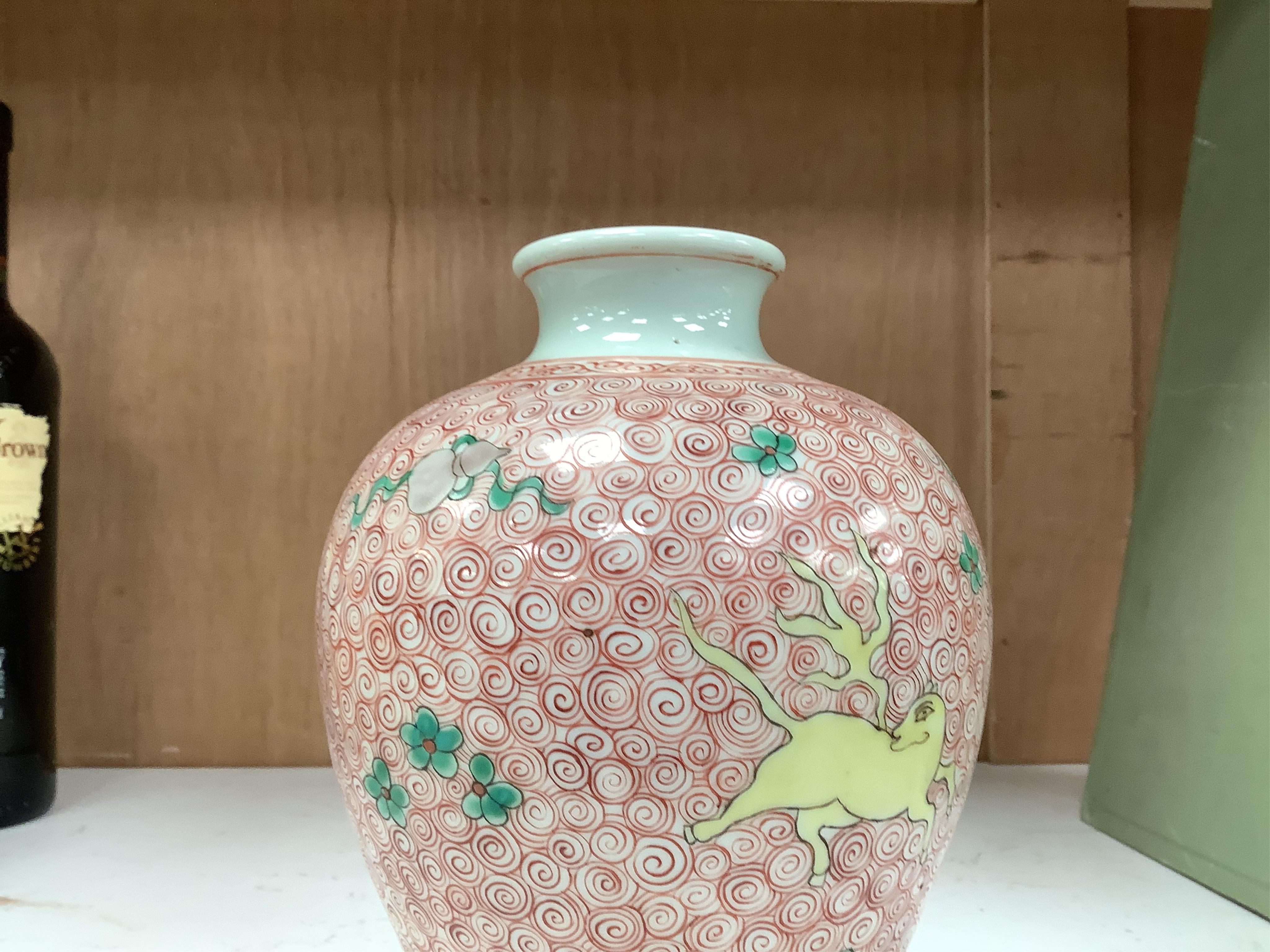 A Chinese famille verte jar, 19cm high. Condition - good